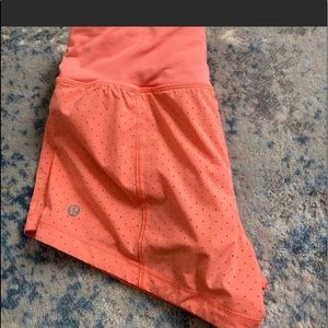 Orange Lululemon shorts